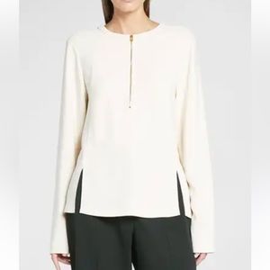 Women’s Stella McCartney white long-sleeve blouse with a zipper
